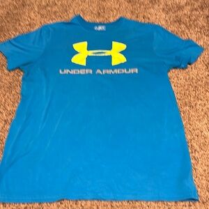 Under armour blue shirt with neon yellow emblem on chest size medium